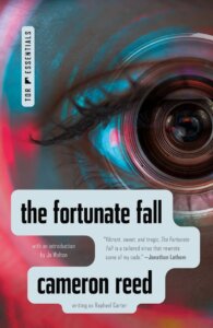 The cover of The Fortunate Fall by Cameron Reed shows the title in all lowerfcase, in a word bubble in front of a person's eye with a camera lens in it 