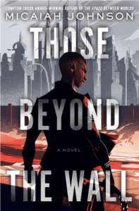 The cover of Those Beyond the Wall by Micaiah Johnson shows an angular person looking over her shoulder at us, with a tall grey city in the background. 