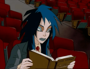 Kylie reading a book written by Egon Spengler