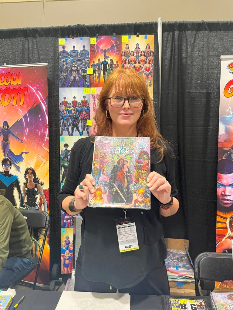 Nicola Scott with her book, Wonder Woman: Historia, at Fan Expo Canada 2024