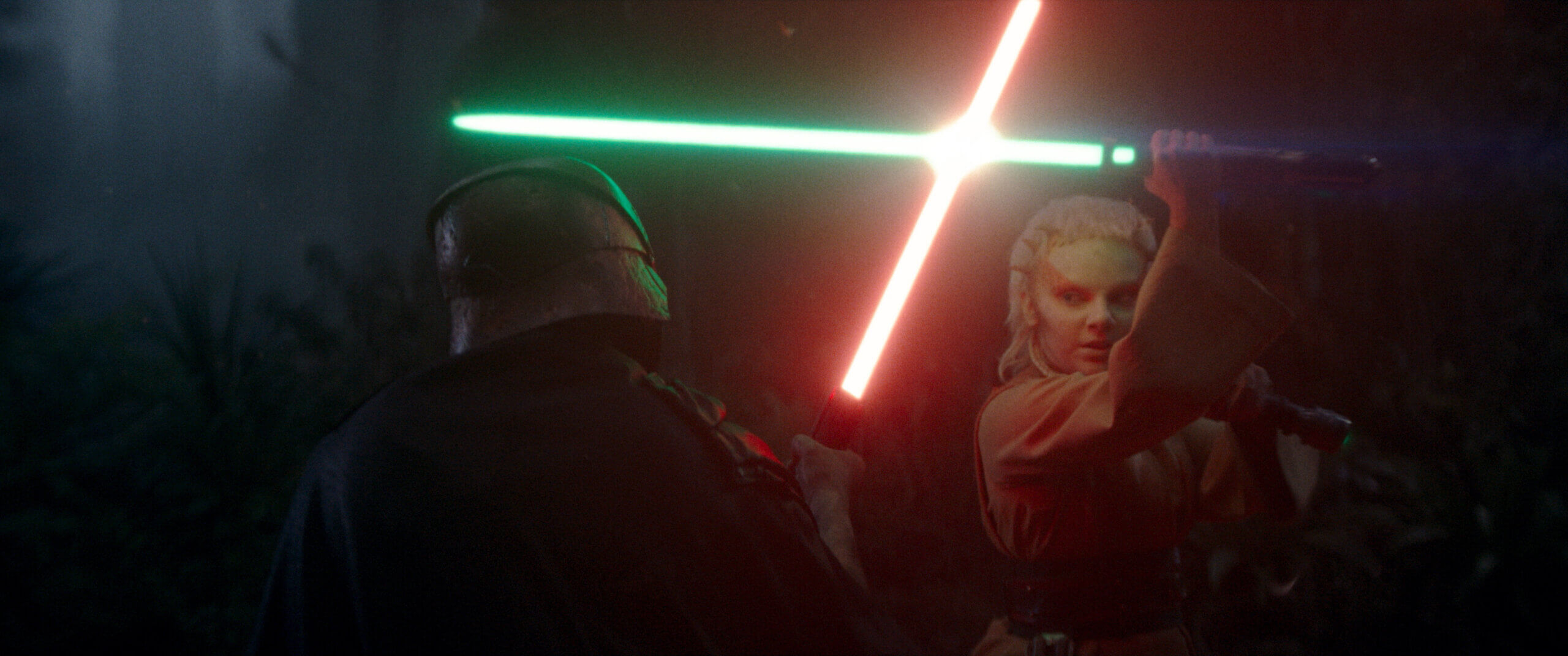 (L-R) The Stranger (Manny Jacinto) and Jedi Padawan Jecki Lon (Dafne Keen) in Lucasfilm's THE ACOLYTE, season one, exclusively on Disney+. ©2024 Lucasfilm Ltd. & TM. All Rights Reserved.