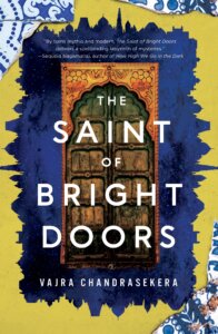 Cover of The Saint of Bright Doors by Vajra Chandrasekera. Illustration shows an ornate door and the outline of a city.